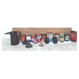 Tote of Old Oil Cans l