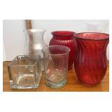 assorted vases, including two red