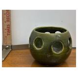 green candle holder pottery
