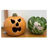 pottery jack-o-lantern and glass vase