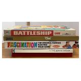 assorted board games, including battleship in