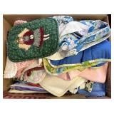 assorted pot holders, and other kitchen towels