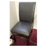 Black vinyl covered chair