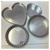 assorted cake and pie pans