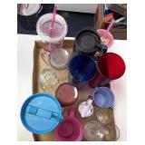 assorted plastic cups, including Longaberger to