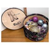 assorted Christmas ornaments, including box