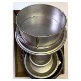 assorted cake and pie pans