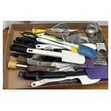 assorted kitchen utensils, including Pyrex