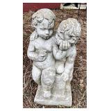 Concrete lawn statue