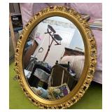 Gold framed mirror