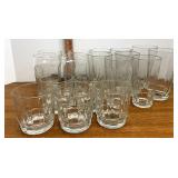 four different sized distinction glasses