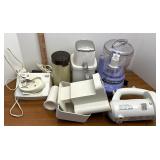 assorted kitchen items including food chopper