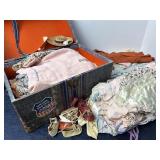 Trunk of doll clothes