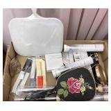 lot of makeup brushes and mirrors