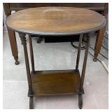 Oval top wooden table