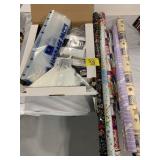 LUGGAGE PACKS, ROLLS OF WRAPPING PAPER, HANGING