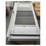 STACK OF REPLACEMENT METAL DOORS & FRAMES