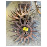 SET OF ANTIQUE CAST IRON IMPLIMENT WHEELS