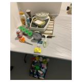 SHARP CLOCK, SCALE, CLEANING SUPPLIES UNDER