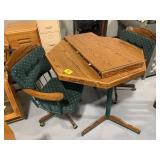 CARVED WOOD DINETTE TABLE, 2 MATCHING ROLLING