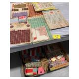 GROUP & 2 FLATS UNDER TABLE OF VINTAGE GAME