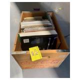 COKE CRATE FULL OF BOOKS