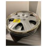 SET OF APPEAR NEW HUBCAPS