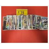 APPROX (100) FOOTBALL CARDS. YOUNG ENTREPRENEUR