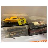 4 MODEL CARS IN CASES