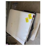 STACK OF FOLDING TABLES