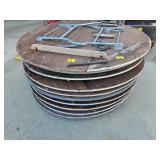 STACK OF APPROX (9) ROUND TABLES