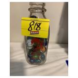 MILK BOTTLE OF MARBLES