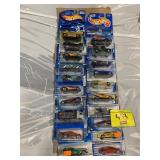 2 ROWS OF HOT WHEELS CARS ON CARDS