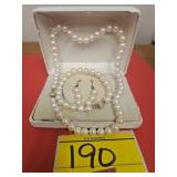 APPROX 17' STRAND OF PEARLS WITH 7' MATCHING