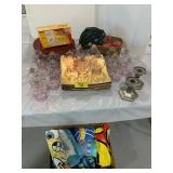 PINK GLASS CANDLE HOLDERS, TOWELS UNDER TABLE,