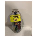 MILK BOTTLE OF MARBLES