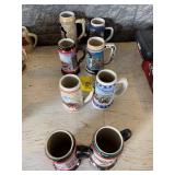 GROUP OF GERMAN & BUDWEISER STEINS (8)