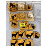 GROUP OF PAINTED WOOD COASTERS