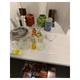 DVDS. VHS ETC UNDER TABLE, CANDLE HOLDERS,