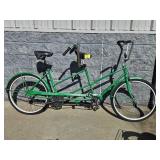 GREEN BICYCLE BUILT FOR TWO TANDEM BIKE