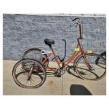 ORANGE ADULT TRICYCLE WITH REAR BASKET