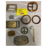 BELT BUCKLES, BIGFOOT PIN, COPPER RINGS?