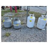 4 PROPANE TANKS