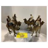 4 ANTIQUE RUBBER CAMEL & RIDER FIGURES, ANTIQUE