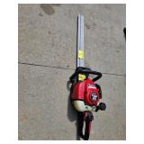 REDMAX GAS POWERED HEDGE TRIMMER. MODEL HTZ2400.