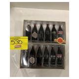 2 SETS OF NOVELTY COKE BOTTLES IN BOXES