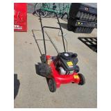 YARD MACHINE PUSH MOWER. STARTS AND RUNS.