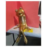BRASS FROG SITTING ON EDGE