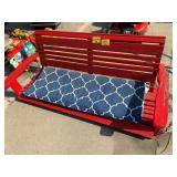RED PAINTED WOODEN PORCH SWING