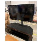 VIZIO TV MOUNTED ON SHELF BASE